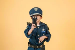 Child disguised as a police man - UK Policies And The TVET Industry, Here's What You Need To Know - Digiformag